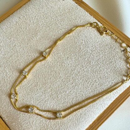 Pulseira ponto de luz banhada a ouro 18k